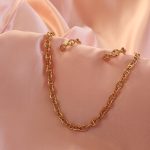 نیم ست جذاب گوشواره و گردنبند طرح کارتیر